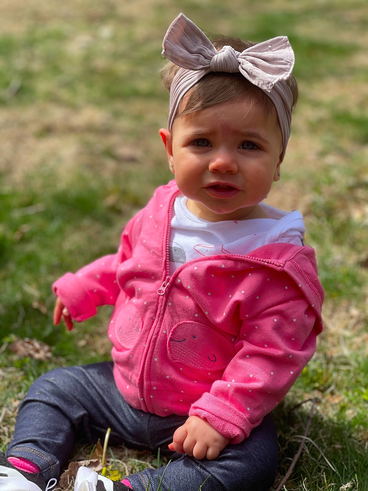 Harper Rose is registered to the contest to win money with this photo: baby, baby_toddler_clothing, cap, child, eye, fun, grass, grass_family, grassland, happy, head, headgear, headwear, people_in_nature, person, pink, plant, sitting, skin, soil