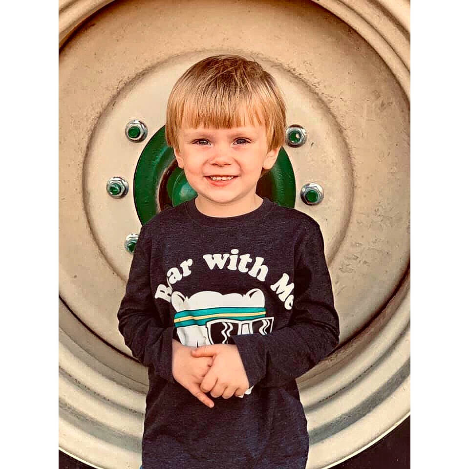 Drake is registered to the contest to win money with this photo: baby, blond, child, cool, ear, eye, happy, joy, long_sleeved_t_shirt, organ, outerwear, person, play, product, sleeve, smile, square, t_shirt, toddler, top