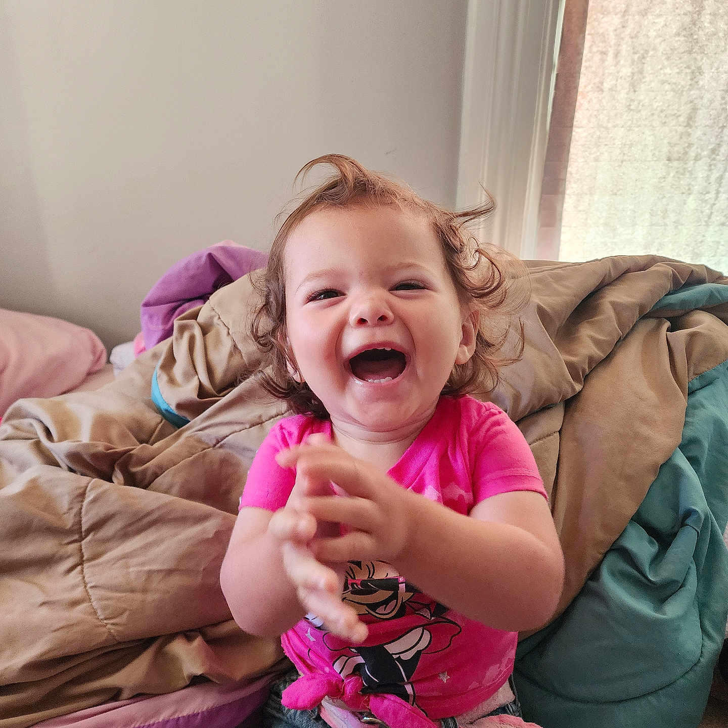 Luna joined the competition — help win amazing prizes! baby, babylaughing, bodypart, clothing, couch, cushion, face, finger, furniture, hand, happy, head, homedecor, jeans, laughing, pants, person, photography, portrait, smile
