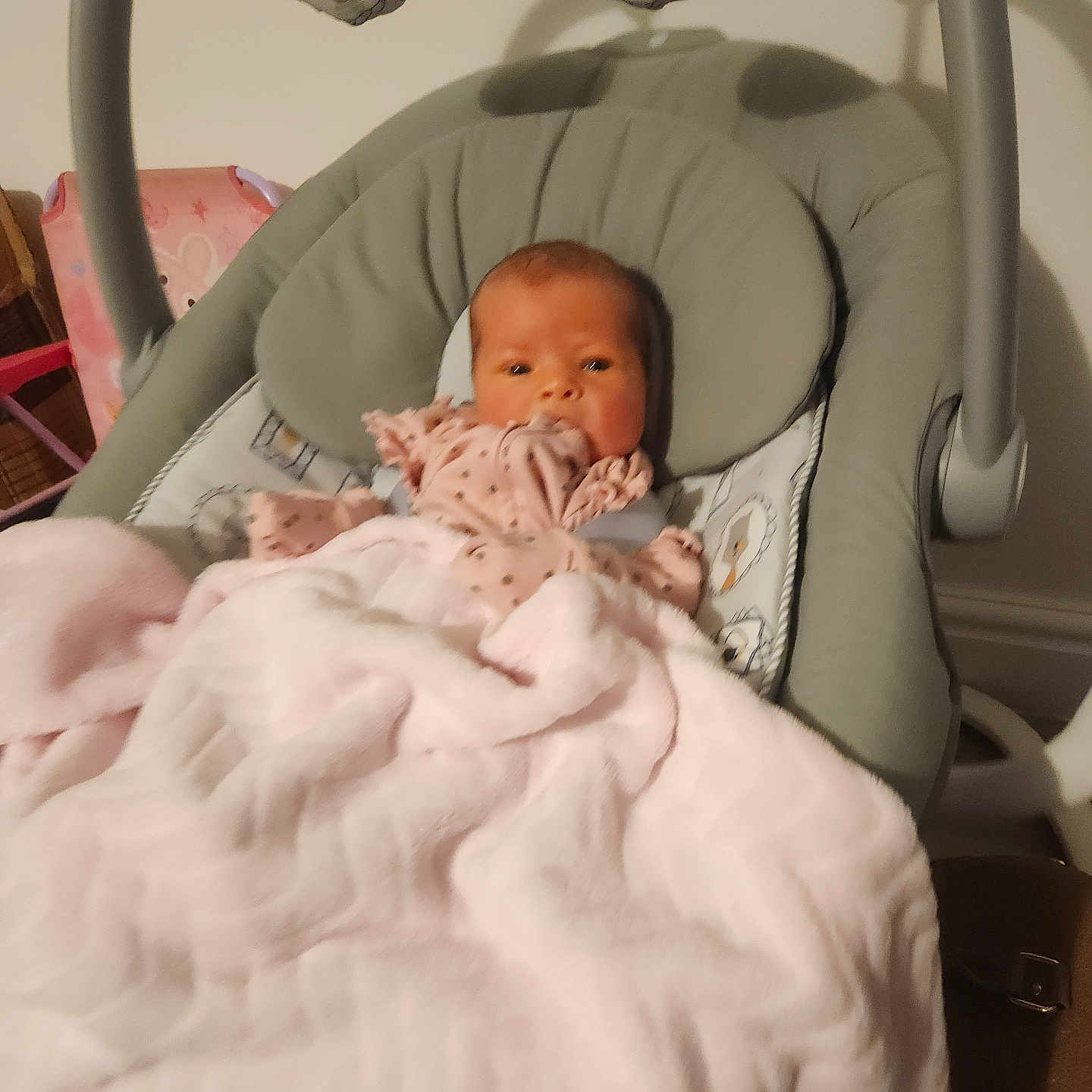 Layla-Rae is registered to the contest to win money with this photo: baby, baby_rocker, blanket, bunny, child, clothing, comfort, cushion, cute, face, gray, indoor, infant, nursery, person, pink, plush_toys, sleeping_area, soft, toy