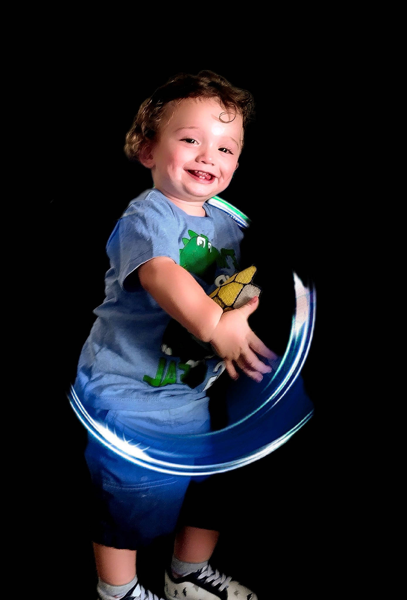 John joined the competition — help win amazing prizes! baby_toddler_clothing, elbow, electric_blue, entertainment, finger, flash_photography, fun, gesture, happy, human_leg, joy, leisure, person, recreation, shorts, sitting, sleeve, smile, sneakers, sportswear