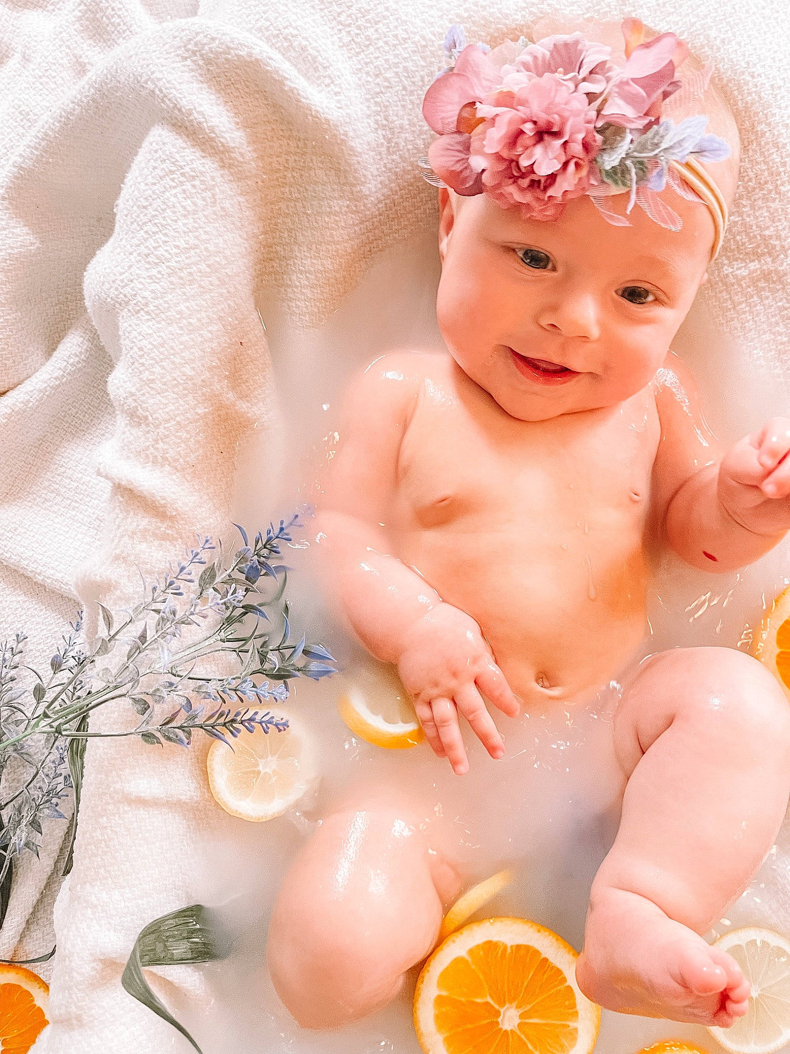 Emberlyn joined the competition — help win amazing prizes! arm, baby, baby_toddler_clothing, bathing, cheek, chest, citrus, finger, flower, fruit, happy, headwear, joy, mandarin_orange, muscle, orange, person, product, skin, smile