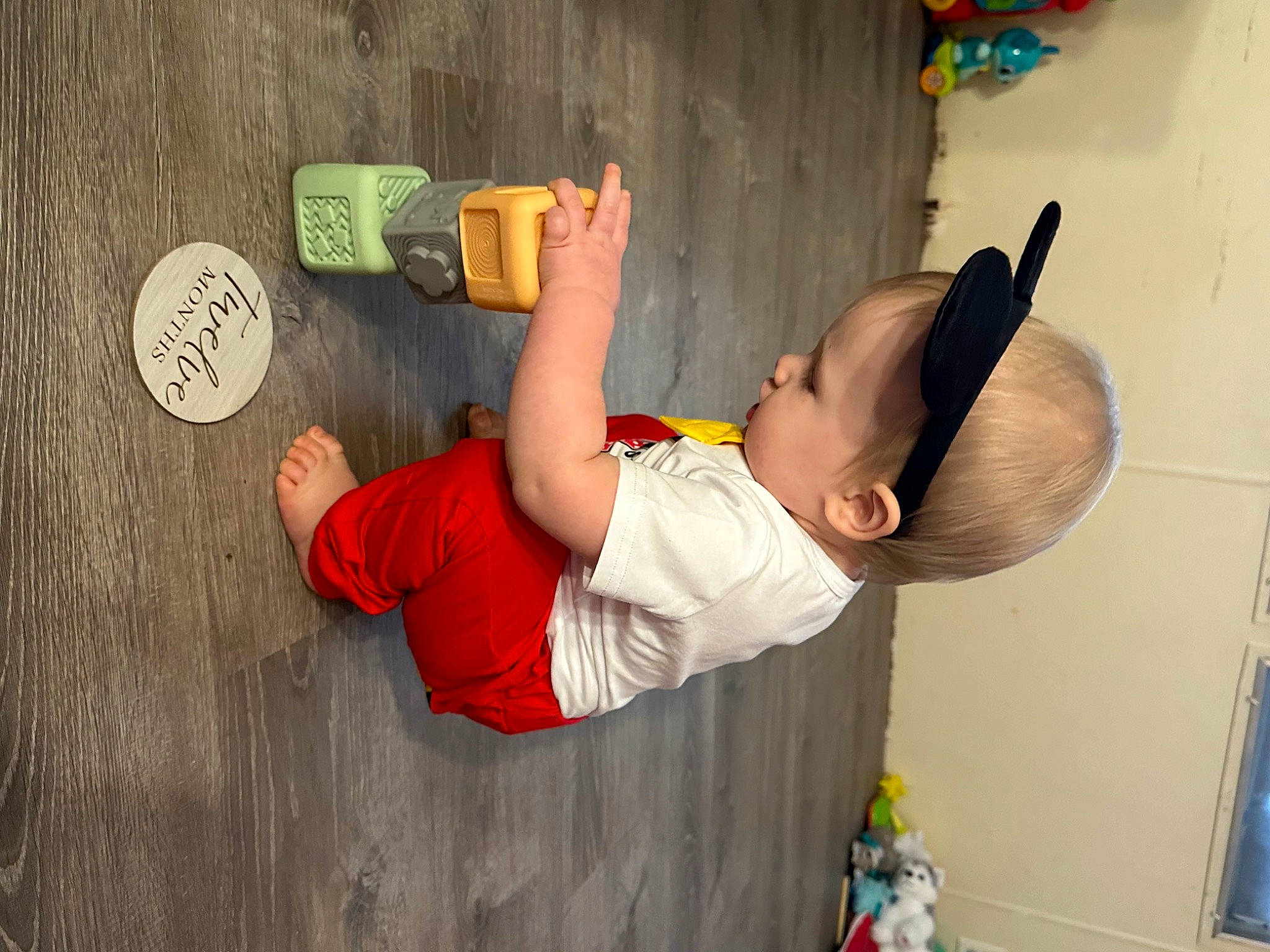 Raiden joined the competition — help win amazing prizes! balance, child, door, elbow, handwriting, hardwood, hat, knee, leisure, paint, person, physical_fitness, room, t_shirt, thigh, toddler, wood