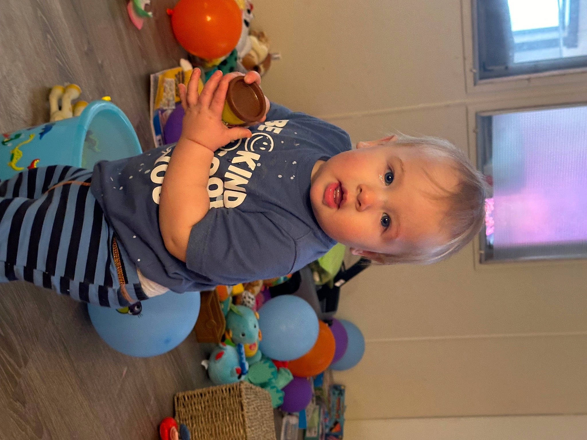 Raiden is registered to the contest to win money with this photo: animation, baby, baby_products, baby_toys, balloon, child, fun, happy, hat, leisure, party, party_supply, person, play, room, sitting, smile, toddler, toy