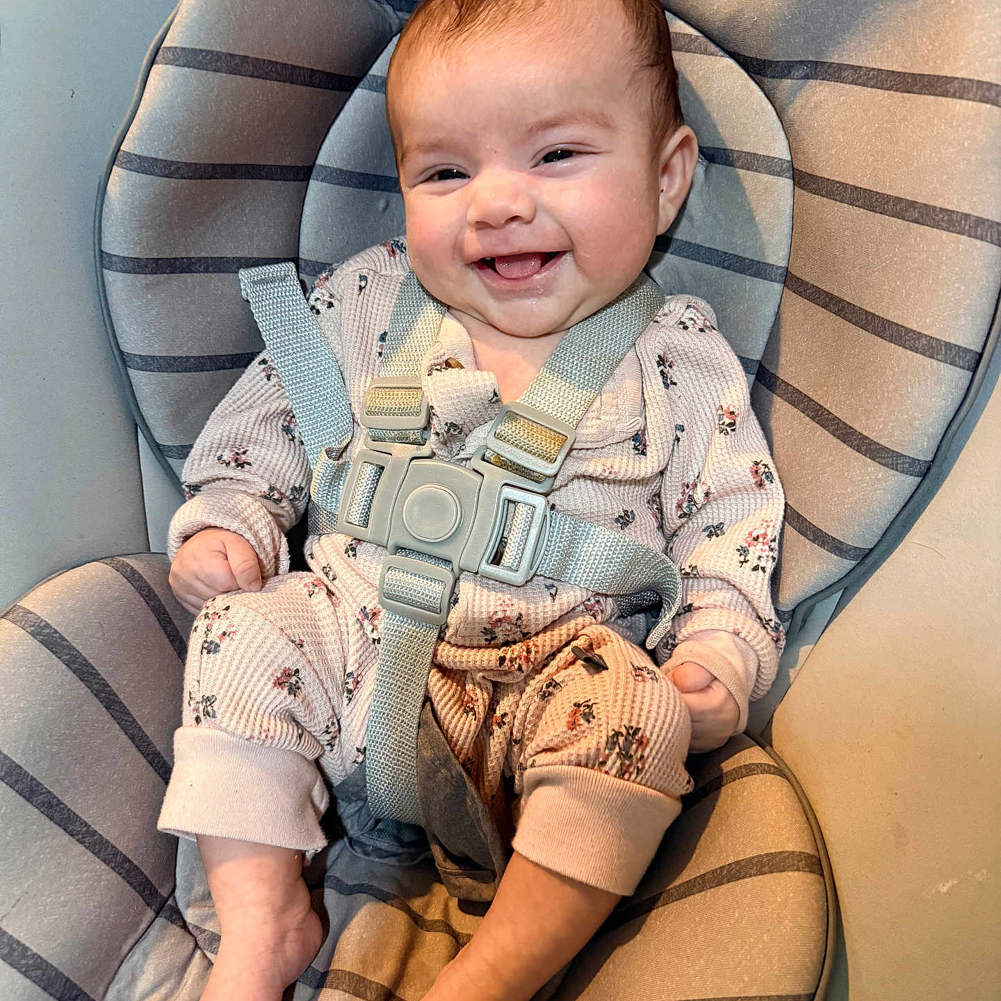 Zully joined the competition — help win amazing prizes! baby, baby_seat, child, closeup, comfort, cushion, cute, face, foot, hand, happy, head, indoor, infant, pajamas, person, safety_harness, seated, smiling, striped_pattern