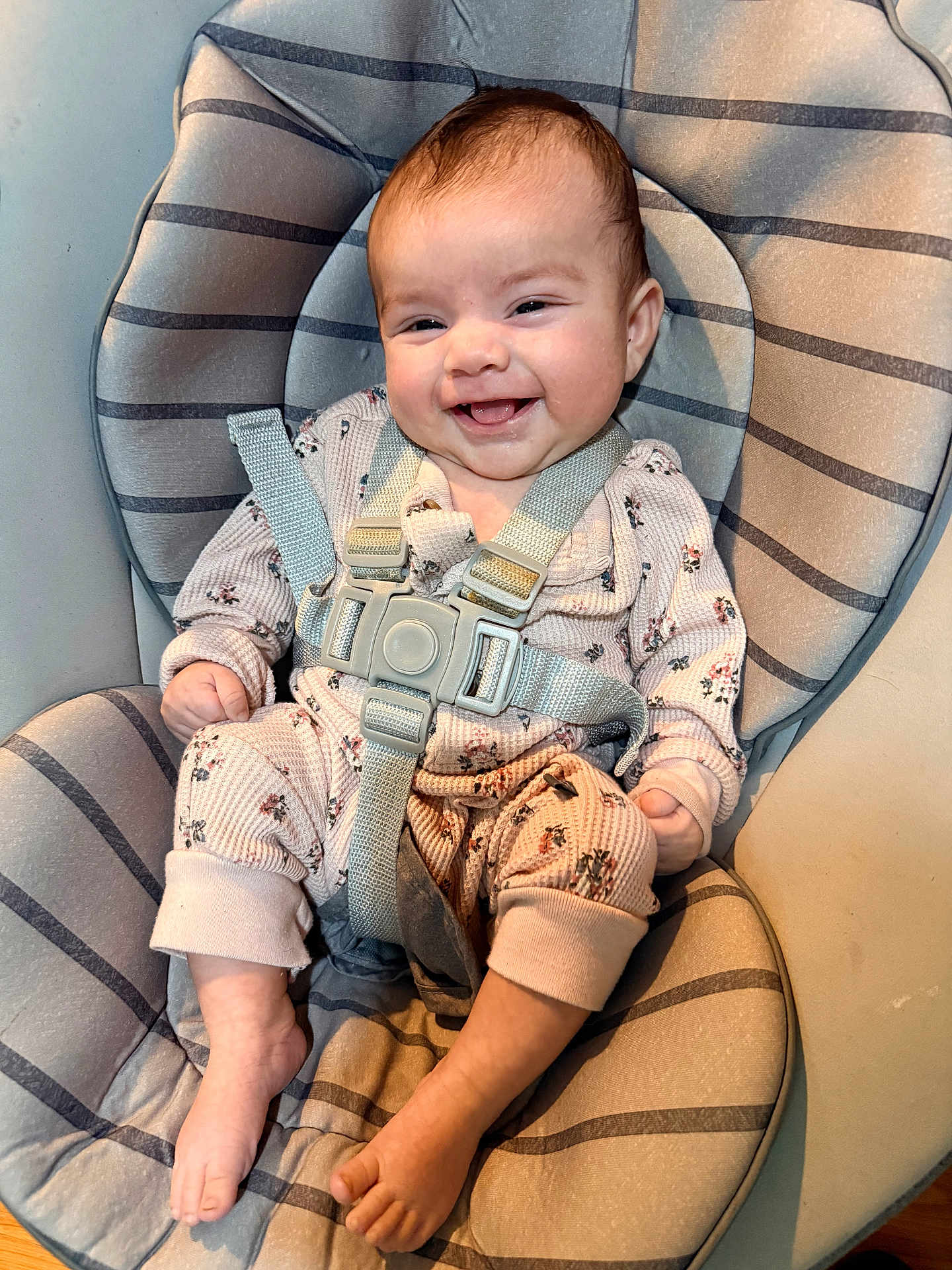 Zully joined the competition — help win amazing prizes! baby, baby_seat, child, closeup, comfort, cushion, cute, face, foot, hand, happy, head, indoor, infant, pajamas, person, safety_harness, seated, smiling, striped_pattern