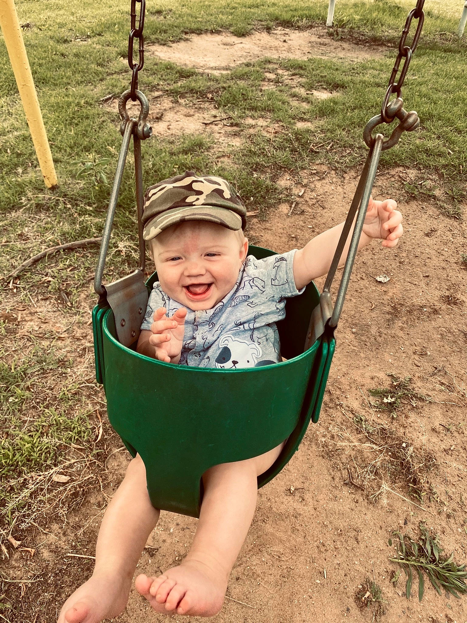 Ledger joined the competition — help win amazing prizes! baby, baby_toddler_clothing, barefoot, child, city, fun, grass, happy, headwear, leisure, outdoor_play_equipment, people_in_nature, person, play, playground, recreation, sitting, smile, soil, swing