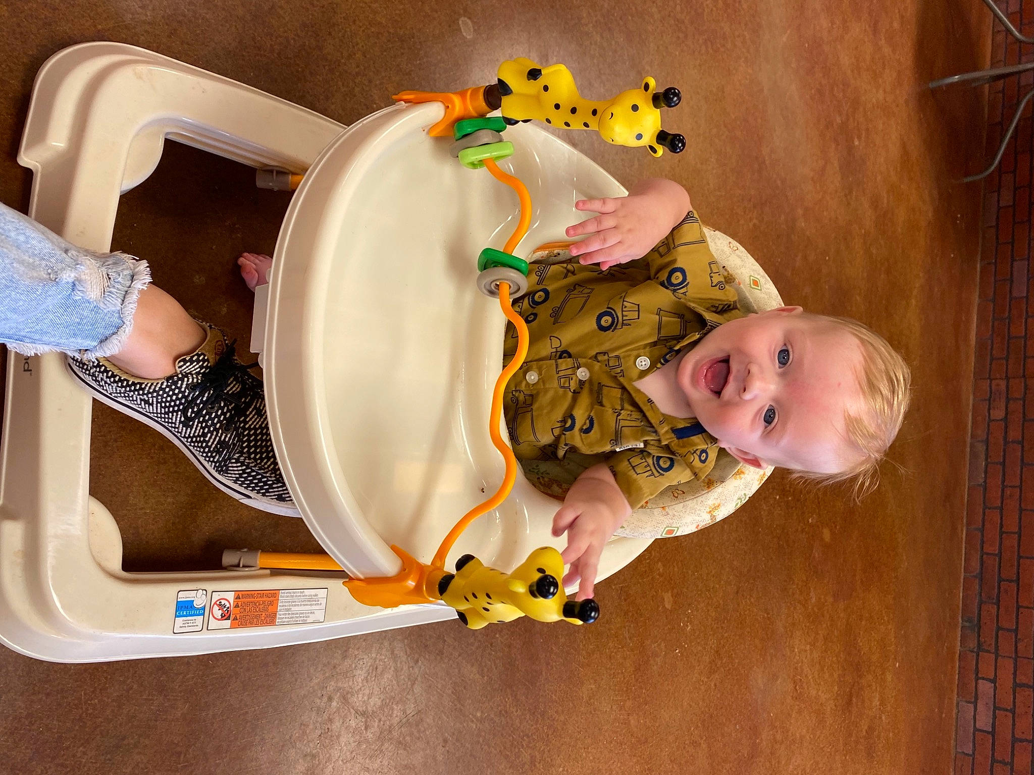 Ledger is registered to the contest to win money with this photo: arm, baby, baby_products, baby_toddler_clothing, baby_toys, child, circle, fun, happy, person, play, product, room, toddler, wood