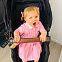 Freya a rejoint le concours — aidez-le/la à gagner de superbes lots ! baby, barefoot, blue_eyes, child, clothing, cute, expression, flooring, grip, hair_bows, handlebar, indoor, light, person, pink_dress, portrait, seat, stroller, toddler, toy