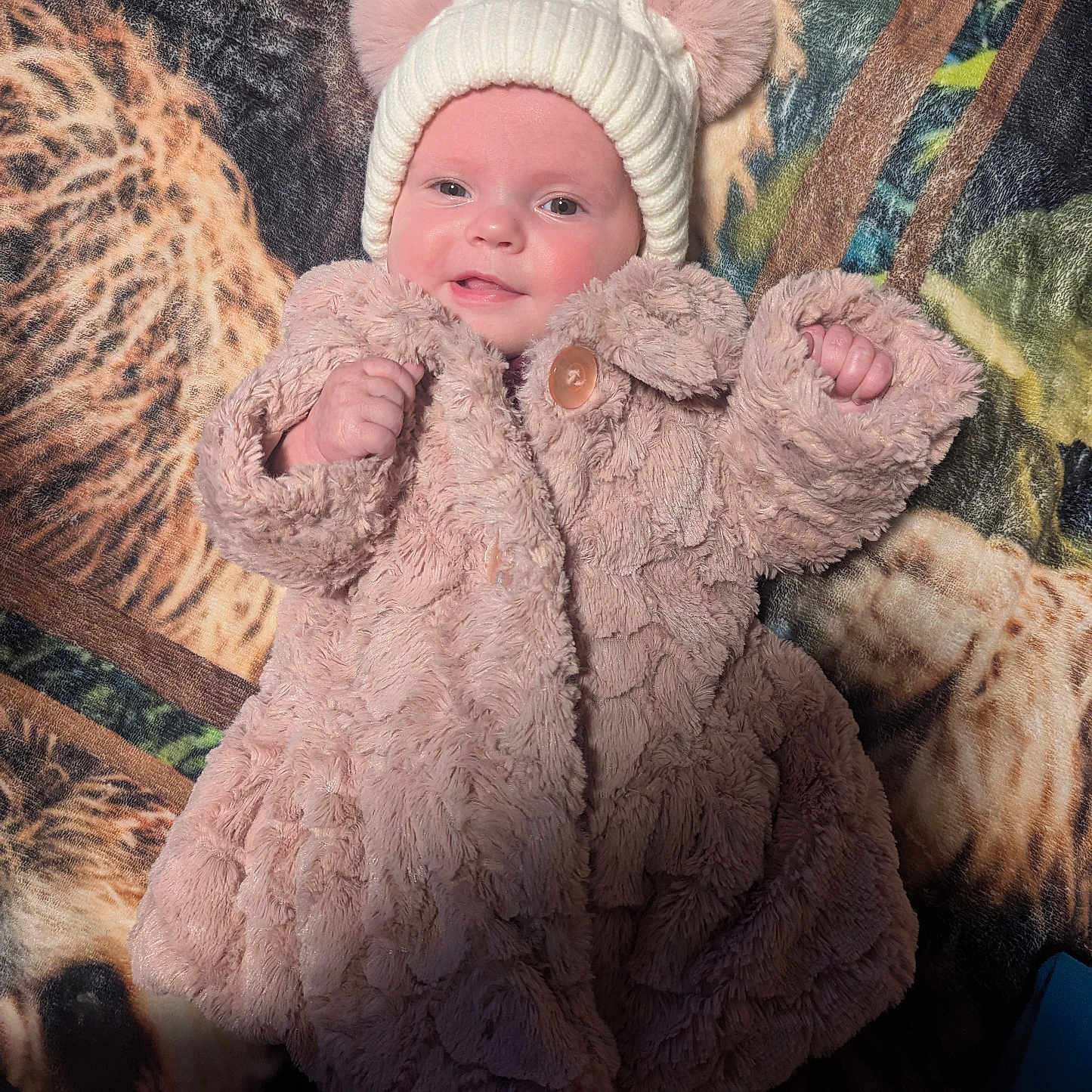 Kiera joined the competition — help win amazing prizes! baby, beanie, bonnet, cap, clothing, coat, costume, face, glove, hat, head, hood, jacket, knitwear, newborn, person, photography, portrait, sweater, toy