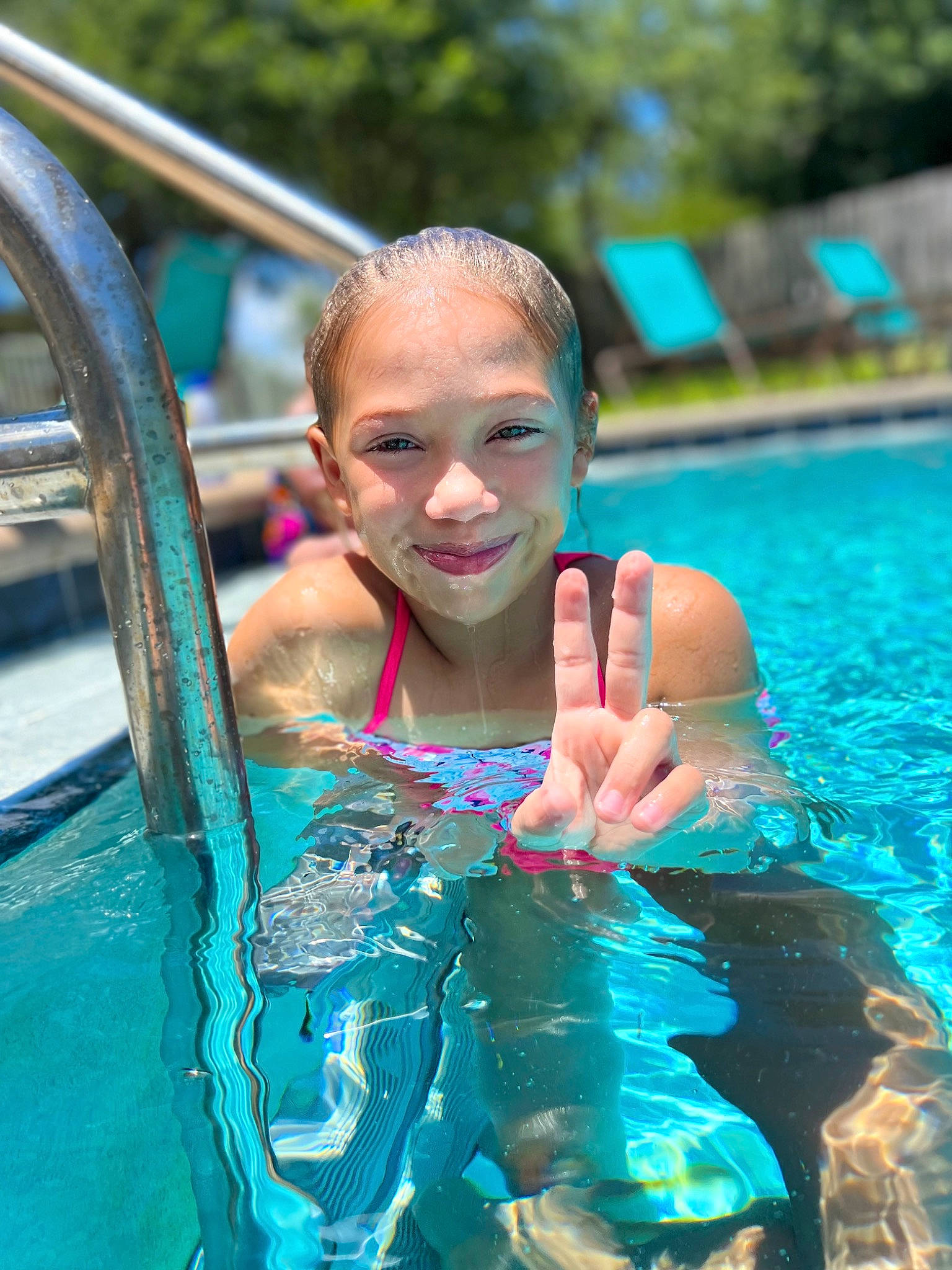 Nevaeh is registered to the contest to win money with this photo: aqua, bathing, blue, chest, child, fun, games, happy, indoor_games_and_sports, joy, leisure, leisure_centre, nonbuilding_structure, person, personal_protective_equipment, pool, recreation, smile, summer, swimming_pool