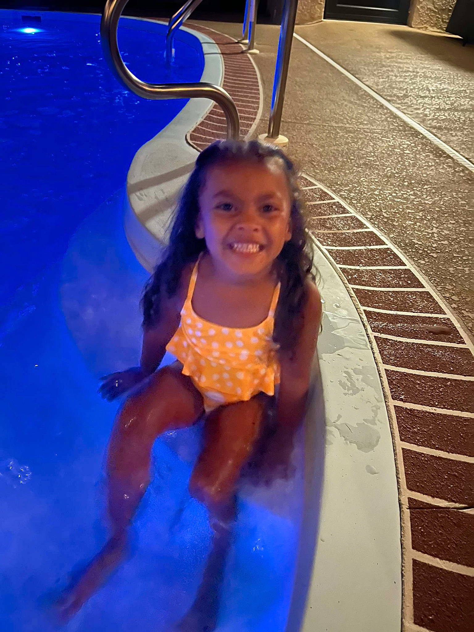 Azariah is registered to the contest to win money with this photo: asphalt, automotive_tire, blue, child, dress, electric_blue, flooring, fun, happy, joy, leisure, light, person, play, recreation, smile, snapshot, swimming_pool, tire, toddler