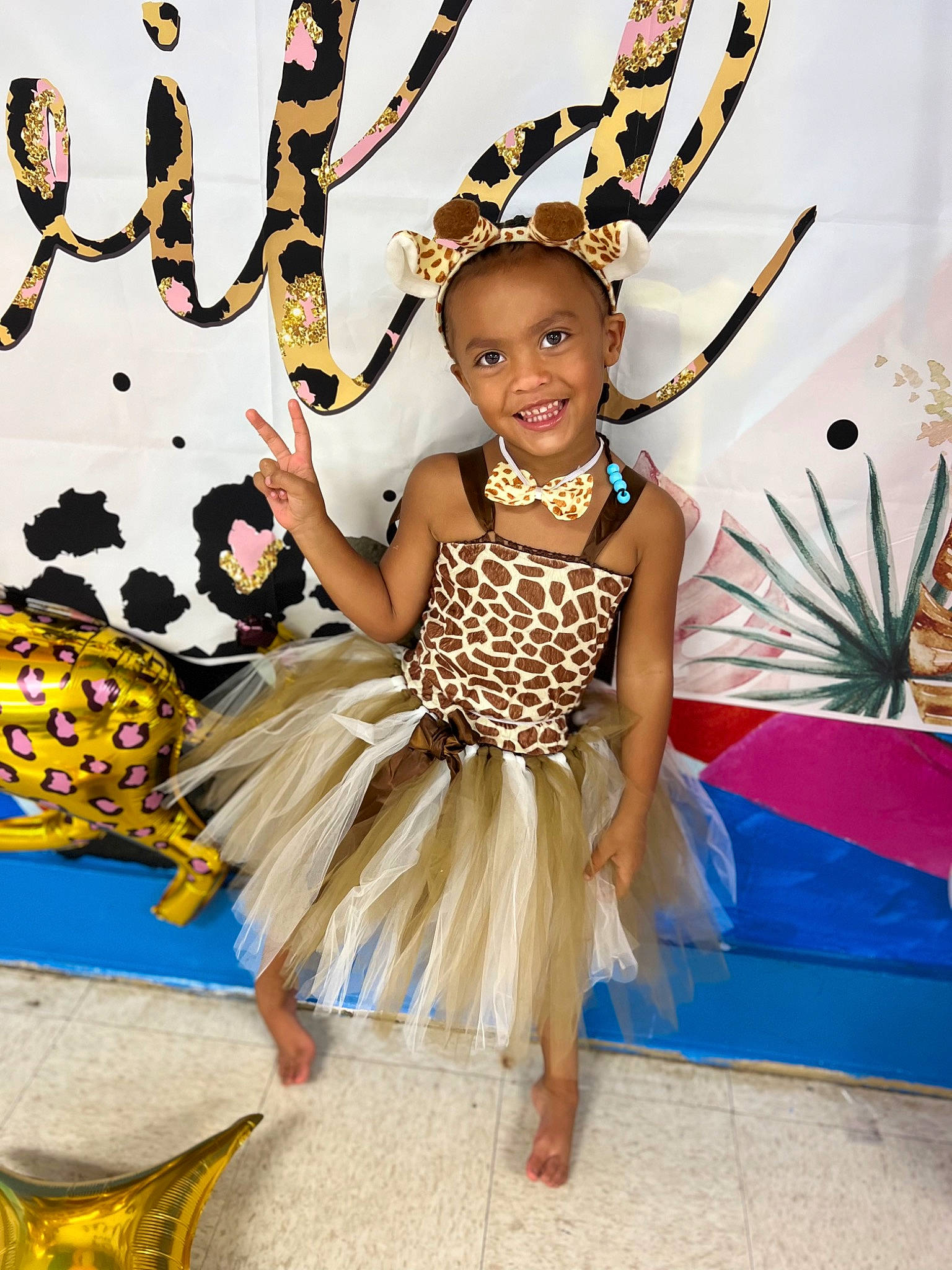Azariah joined the competition — help win amazing prizes! child, costume, dance, entertainment, event, fashion_accessory, fashion_design, fun, gesture, happy, headpiece, jewellery, joy, leisure, necklace, party_supply, performing_arts, person, smile, toddler
