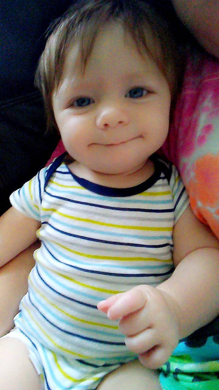 Grayson is registered to the contest to win money with this photo: baby, baby_toddler_clothing, cheek, child, chin, eyelash, facial_expression, finger, happy, iris, lip, nose, person, photograph, product, sitting, skin, sleeve, smile, thumb