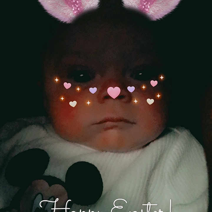 Jerry is registered to the contest to win money with this photo: baby, bodypart, bonnet, clothing, cushion, doll, electronics, face, finger, hand, hardware, hat, head, homedecor, newborn, person, photography, portrait, purple, toy