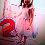 child, birthday, dress, crown, number_two, pink, curtains, bed, toy, unicorn, indoor, happy, celebration, footwear, person, smiling, decorations, party, girl, window