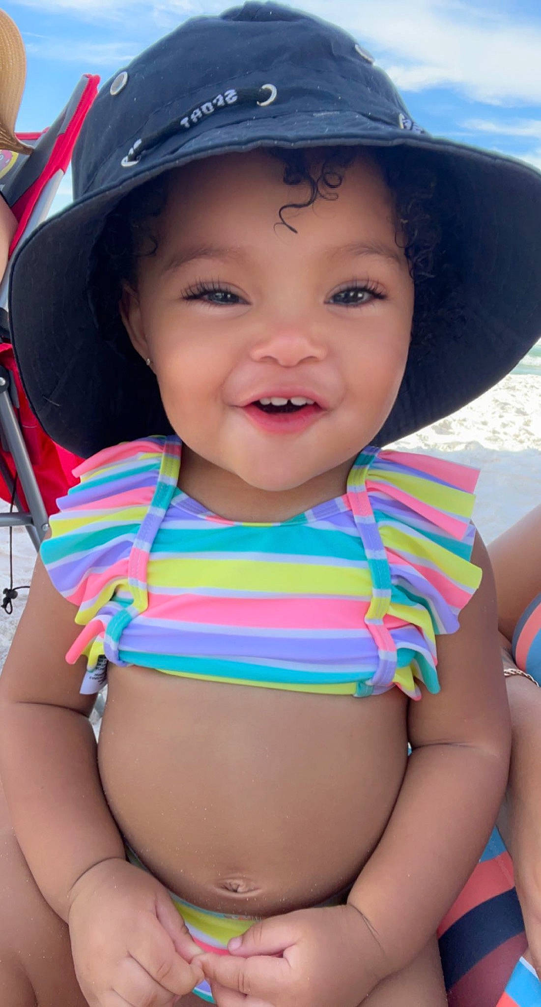 Gabriella joined the competition — help win amazing prizes! baby_toddler_clothing, beauty, child, face, facial_expression, fun, happy, hat, headgear, headwear, joy, leisure, organ, person, personal_protective_equipment, pink, skin, smile, summer, swimwear