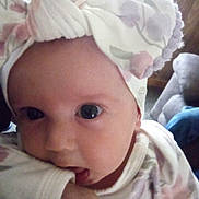 Gracie is registered to the contest to win money with this photo: baby, baby_toddler_clothing, cheek, child, chin, comfort, ear, eye, eyebrow, eyelash, happy, headgear, headpiece, iris, lip, mouth, nose, pink, skin, toddler