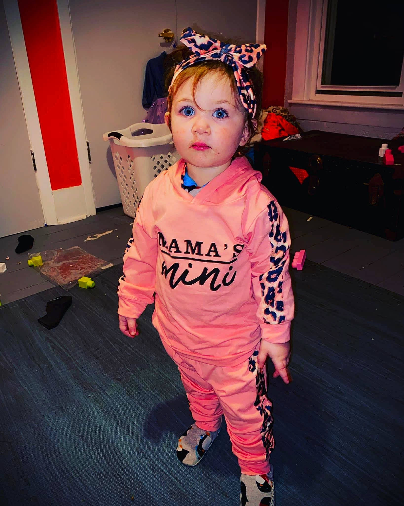Paisley is registered to the contest to win money with this photo: baby_toddler_clothing, child, cool, costume, costume_hat, door, event, fashion_accessory, flooring, fun, happy, head, headgear, party_supply, person, pink, room, sleeve, toddler, trick_or_treat