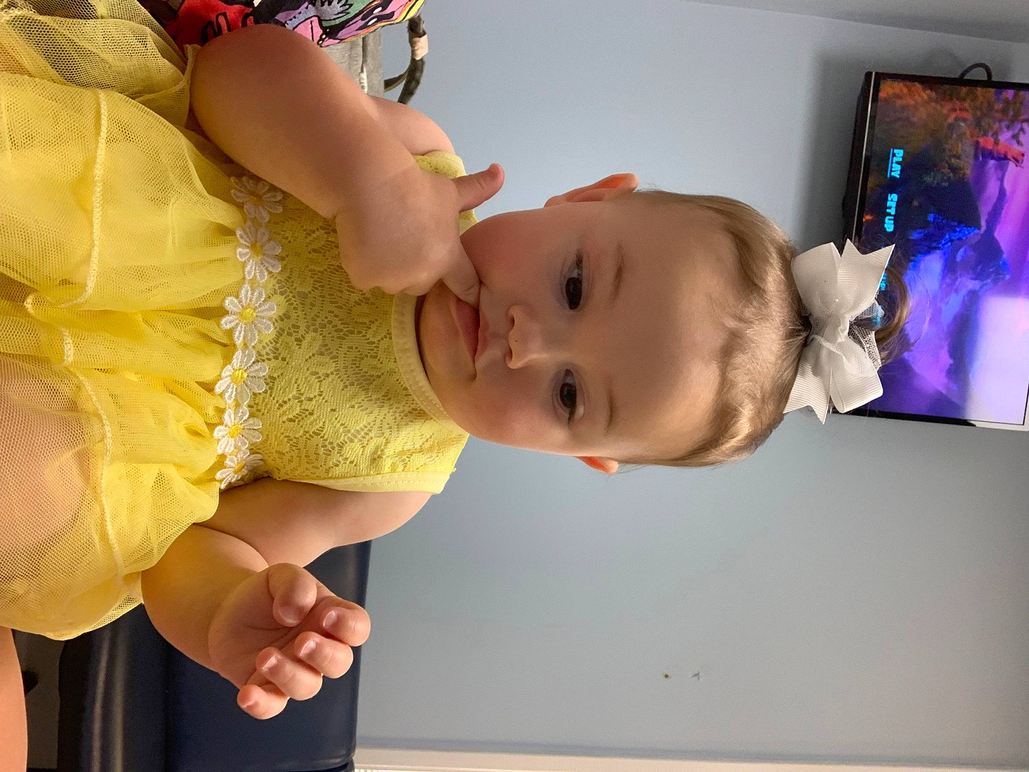 Isabel is registered to the contest to win money with this photo: abdomen, baby, baby_products, baby_toddler_clothing, cheek, child, elbow, finger, fun, gesture, happy, human_body, human_leg, person, pink, skin, sleeve, smile, thumb, toddler