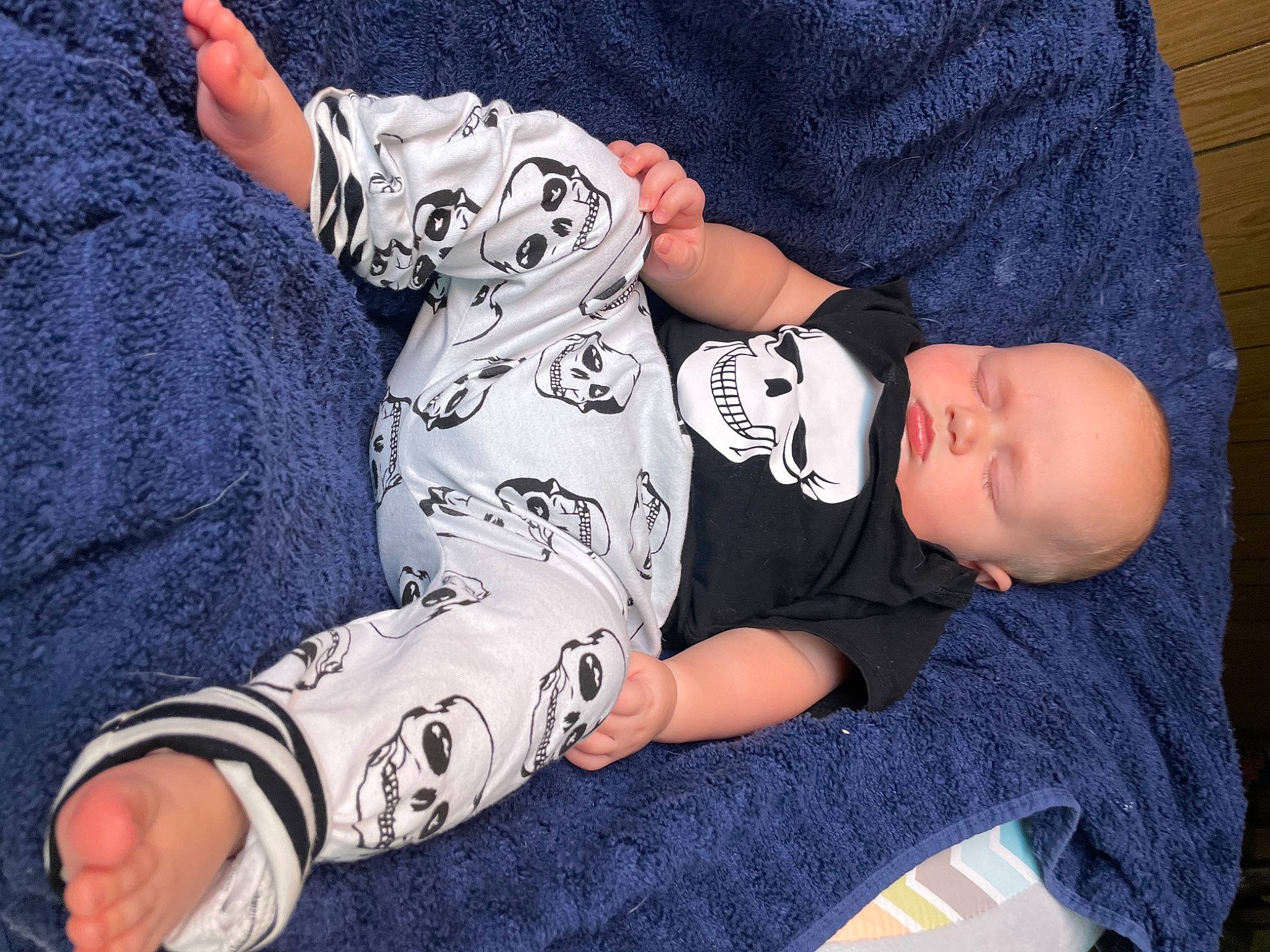 Nixon joined the competition — help win amazing prizes! arm, baby, baby_toddler_clothing, child, comfort, elbow, finger, hand, human_body, human_leg, joint, knee, leg, mammal, pattern, person, sleeve, sock, t_shirt, thigh
