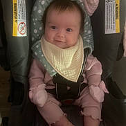 Genesis And Psalm joined the competition — help win amazing prizes! baby, infant, car_seat, seat_buckle, bib, mittens, pink_clothes, polka_dot_headrest, smile, eyes, hair, blanket, warning_label, indoor, portrait, cozy, legs, toes, soft_lighting, parenting