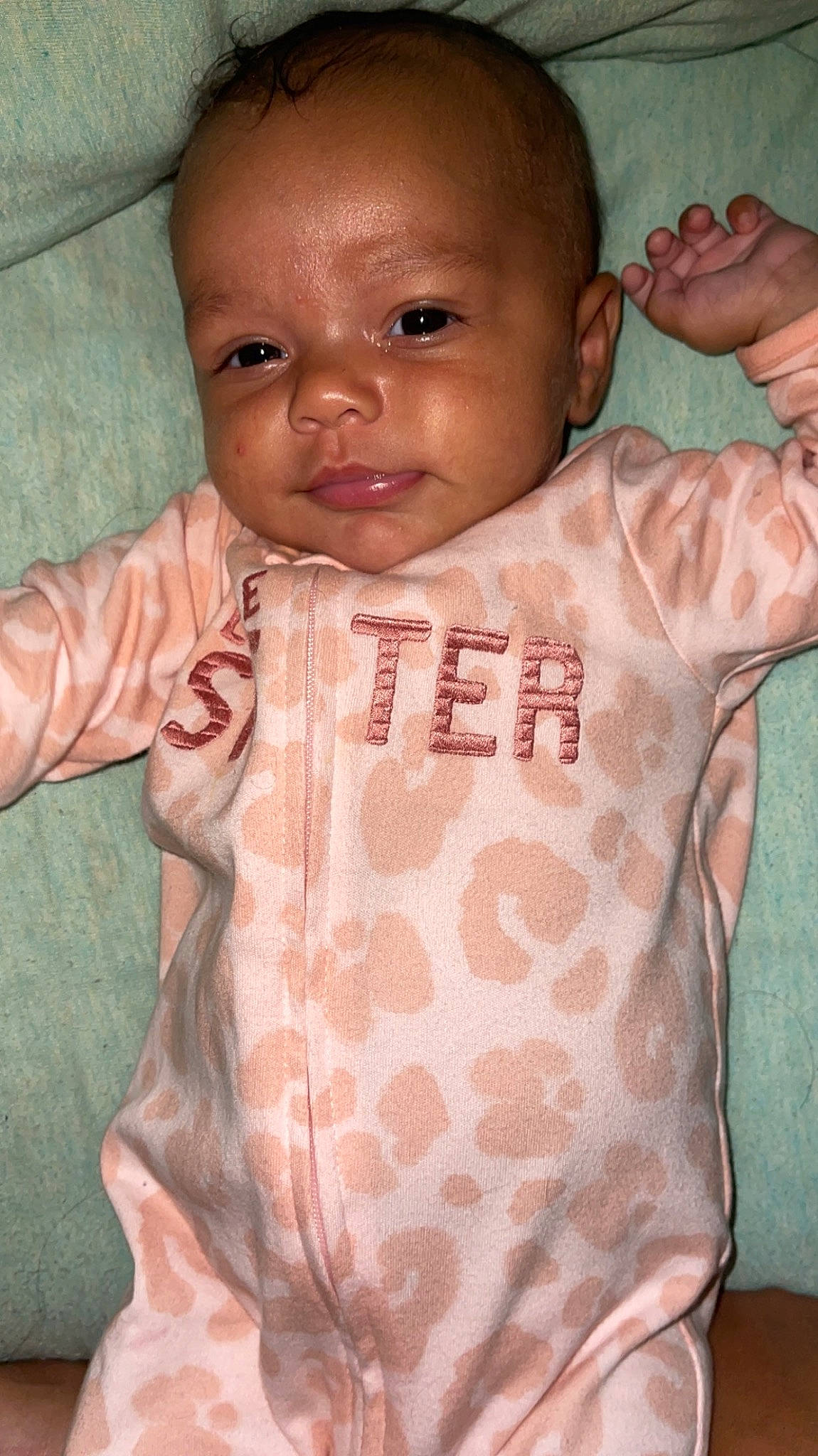 Evelyn joined the competition — help win amazing prizes! baby, baby_toddler_clothing, cheek, chest, child, chin, eyelash, finger, gesture, hand, head, joint, neck, nose, person, pink, skin, sleeve, textile, thumb