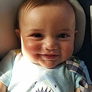 Weston joined the competition — help win amazing prizes! baby, smiling, face, child, car_seat, clothing, plaid_strap, blanket, cute, infant, portrait, indoors, happy, cheeks, light, shadow, seatbelt, young_child, casual, closeup