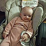 Charlie participe au concours pour gagner de l'argent avec cette photo : baby, infant, onesie, smile, cushion, baby_seat, blanket, hand, face, indoor, clothing, comfort, child, cute, young, portrait, relaxed, soft_lighting, home, cozy