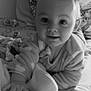 Charlie participe au concours pour gagner de l'argent avec cette photo : baby, bed, black_and_white, blanket, child, clothing, comfort, cute, face, furniture, indoors, infant, laying, light, portrait, smile, soft, toddler, warm, young