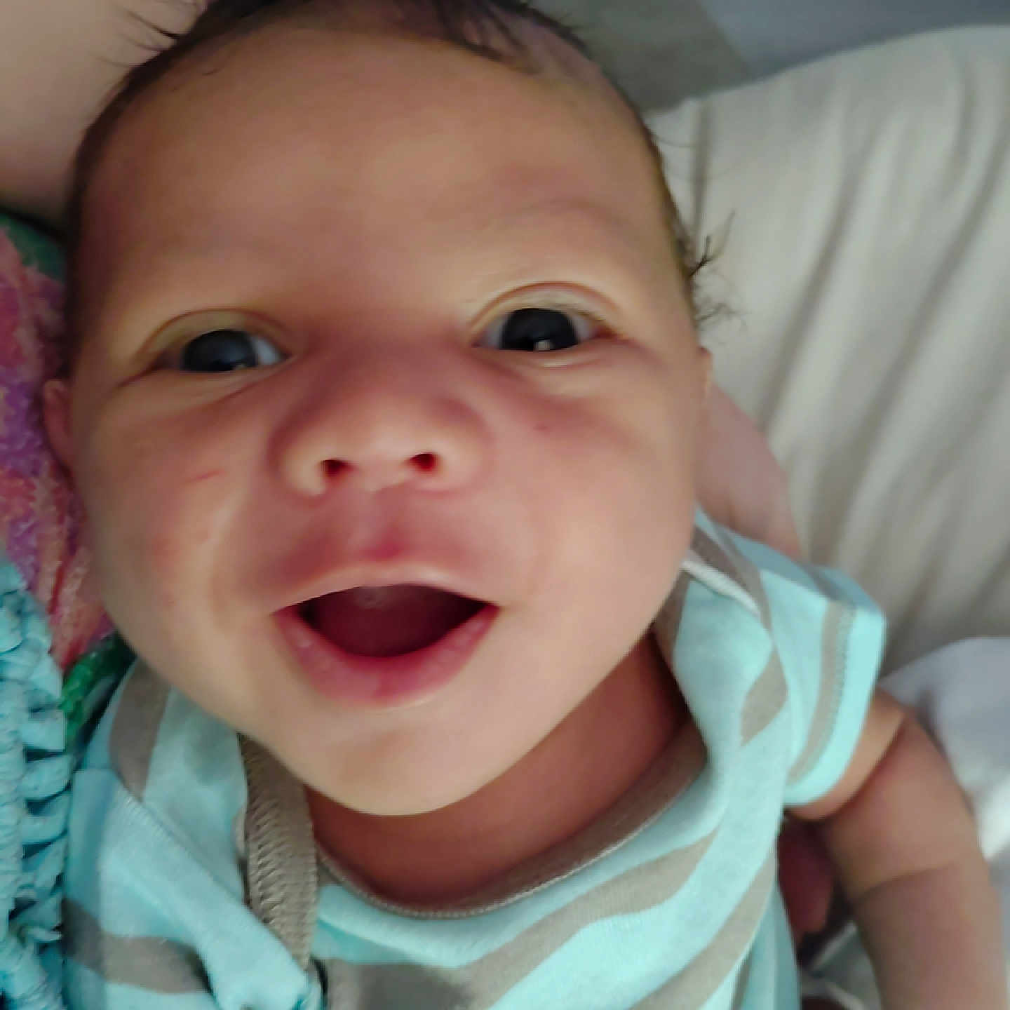 Onyx is registered to the contest to win money with this photo: baby, babylaughing, bodypart, face, finger, hand, happy, head, laughing, mouth, newborn, person, photography, portrait, smile