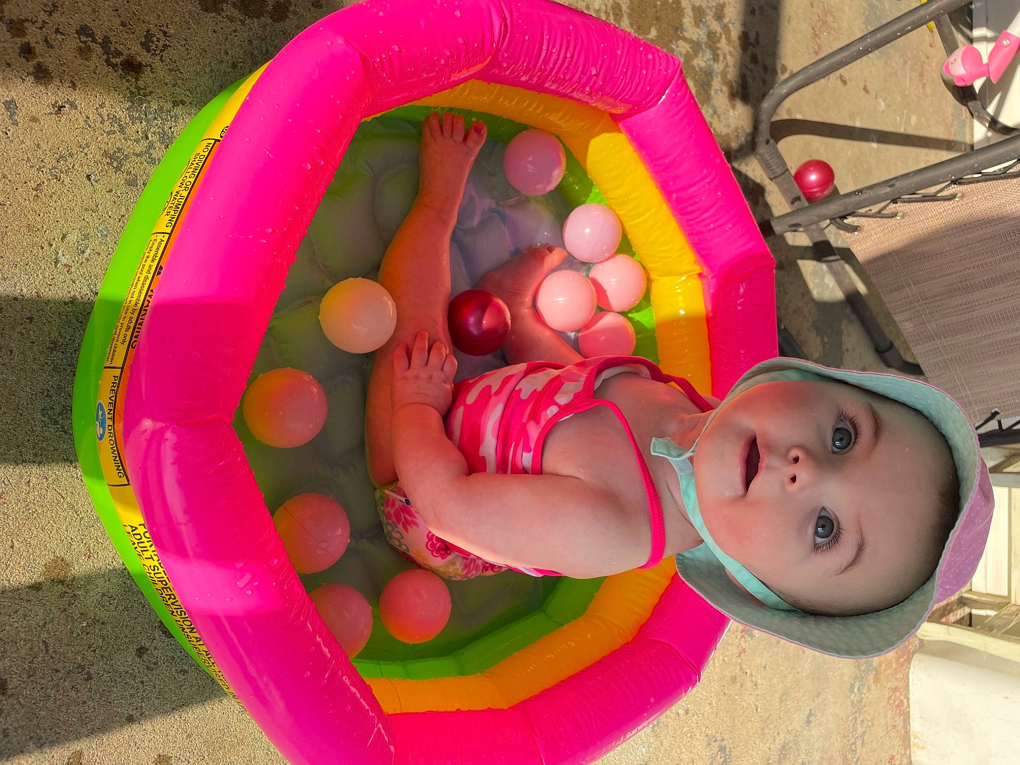Hendrix joined the competition — help win amazing prizes! baby, baby_products, baby_toddler_clothing, baby_toys, child, circle, comfort, fun, grass, inflatable, leisure, magenta, person, pink, play, recreation, toddler