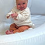 Lotte-Rose joined the competition — help win amazing prizes! baby, infant, child, tongue_out, smiling, white_chair, playful, indoor, cozy_clothes, sitting, cute, happy, light_skin, short_hair, toy_balls, floor_mat, portrait, small_hands, barefoot, warm_lighting