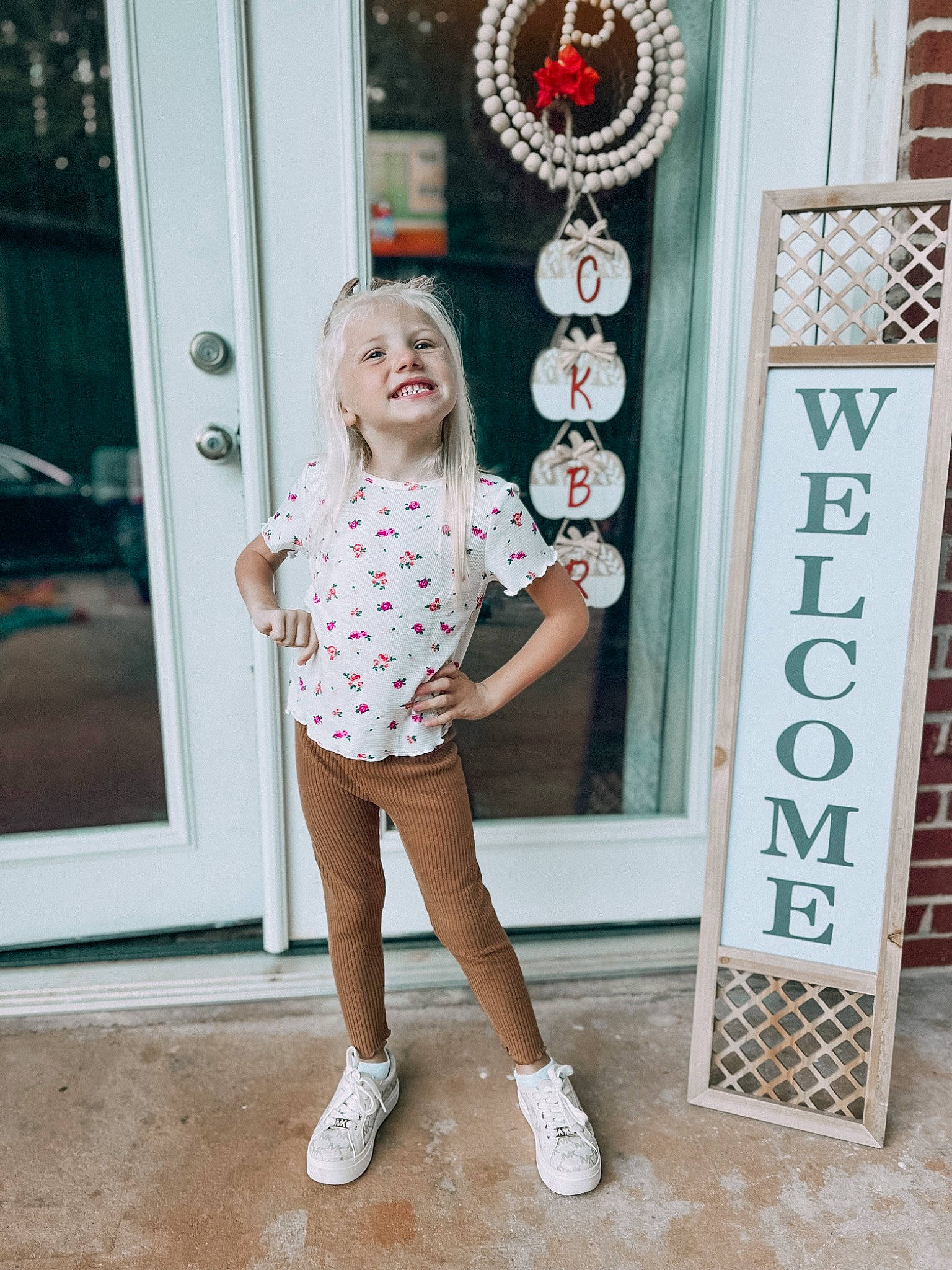 Bailyn Dale joined the competition — help win amazing prizes! child, door, fashion_design, fun, happy, human_leg, joy, knee, pattern, person, room, sandal, shorts, sleeve, smile, t_shirt, thigh, toddler, vacation, visual_arts