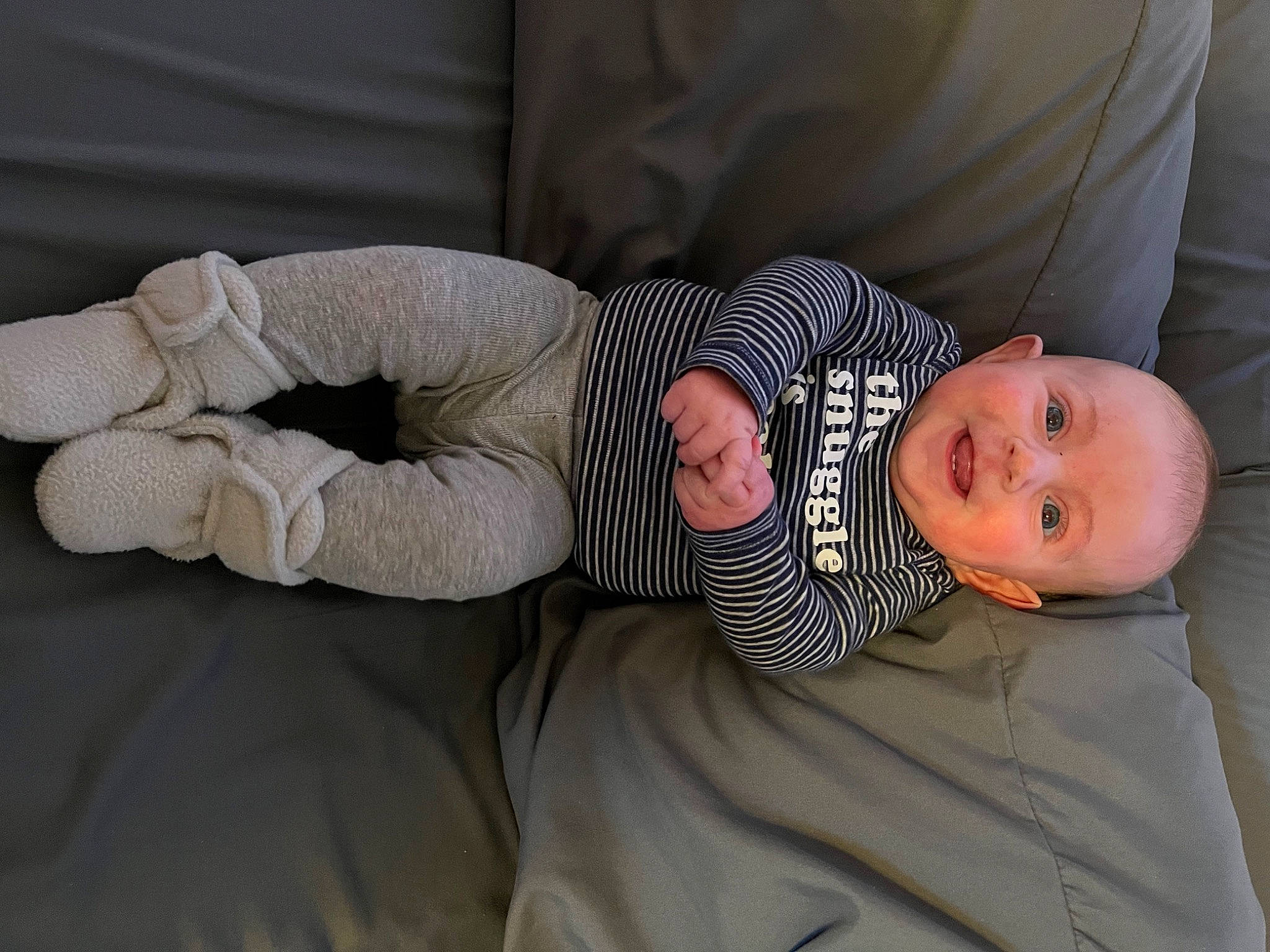 Brylee joined the competition — help win amazing prizes! arm, baby, baby_toddler_clothing, bedding, child, comfort, couch, human_leg, leg, linens, mammal, person, room, sitting, skin, sleeve, smile, textile, toddler, tree