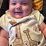 Maliyah joined the competition — help win amazing prizes! baby, smiling, infant, cute, giraffe, embroidered_clothing, butterfly, patterned_background, child, sitting, closeup, happy, cute_clothing, soft_lighting, indoor, person, head, face, arm, hand