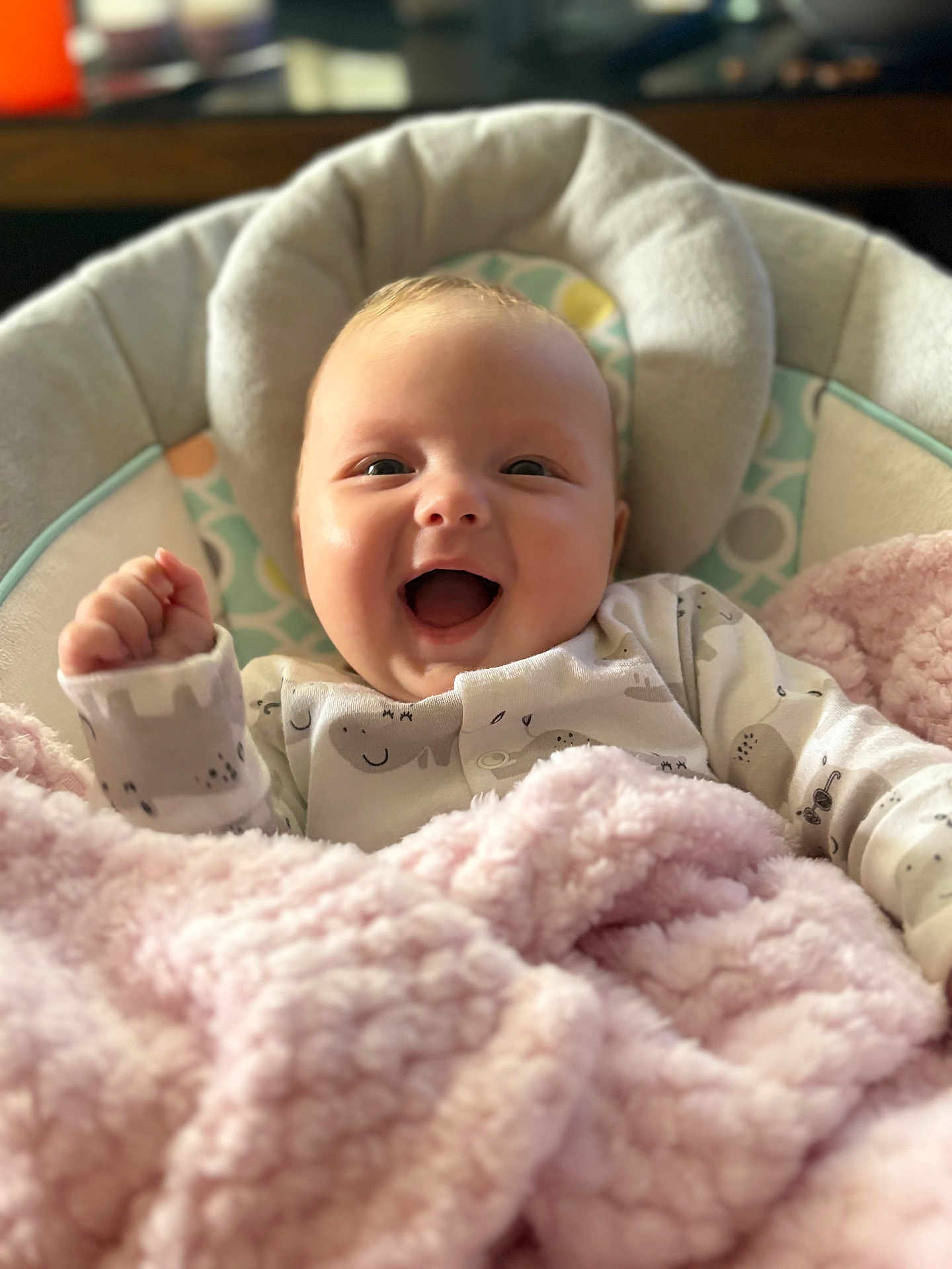 Maliyah joined the competition — help win amazing prizes! baby, smiling, blanket, pink, cushion, infant, happy, cozy, soft, clothing, sitting, face, indoors, child, portrait, cute, warm, newborn, comfort, expression