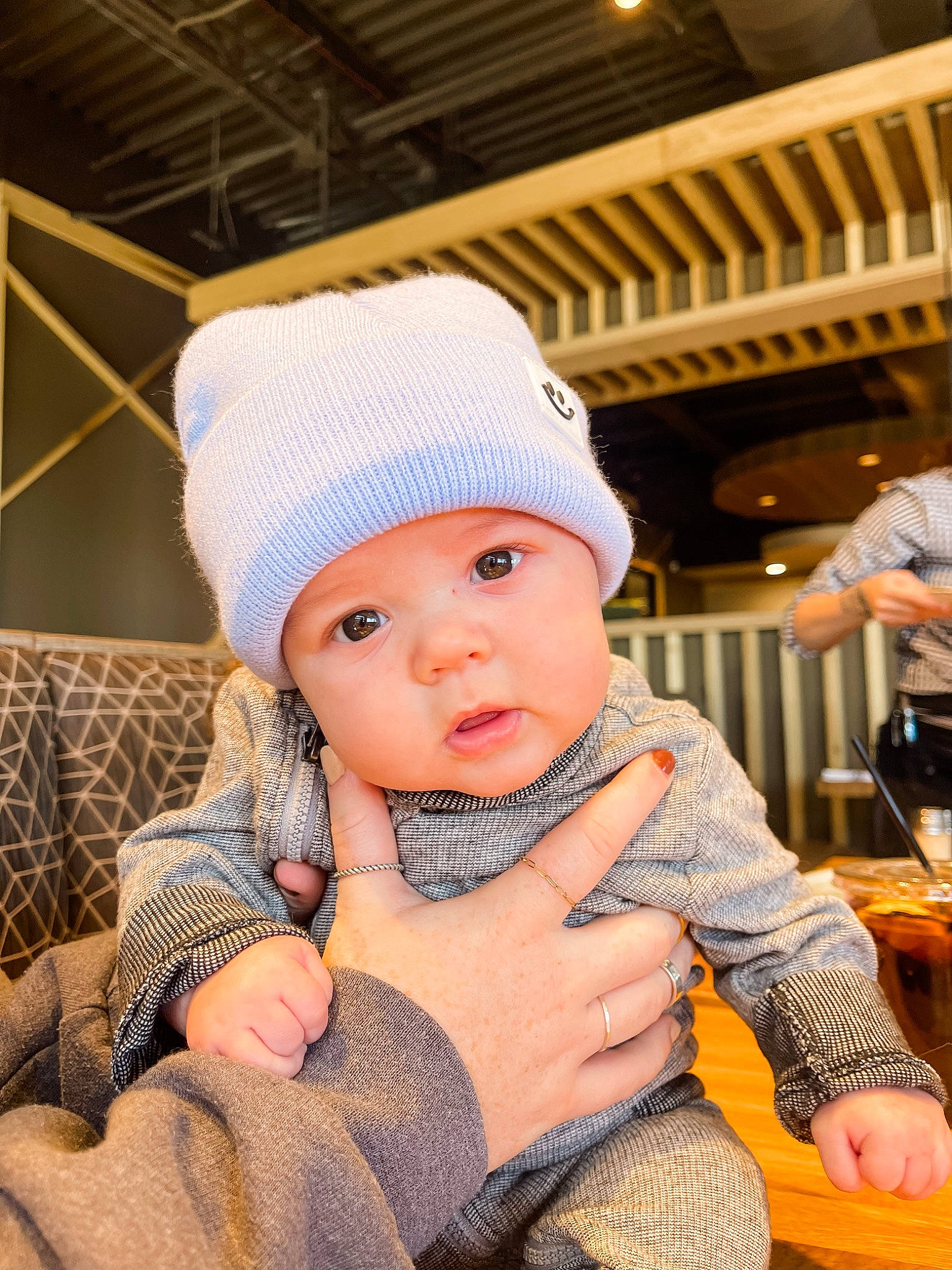 Brazos is registered to the contest to win money with this photo: baby, baby_toddler_clothing, beanie, cap, cheek, child, fashion_accessory, flash_photography, fun, happy, headgear, headwear, knit_cap, pattern, person, portrait_photography, sitting, sleeve, toddler, winter