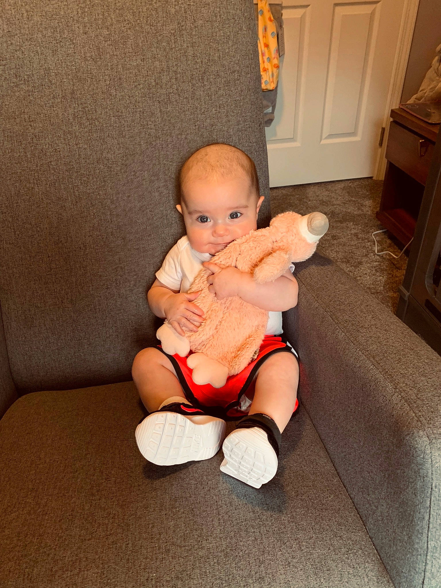 Giovanna joined the competition — help win amazing prizes! baby, cheek, child, joint, knee, leg, person, room, sitting, skin, toddler, toy