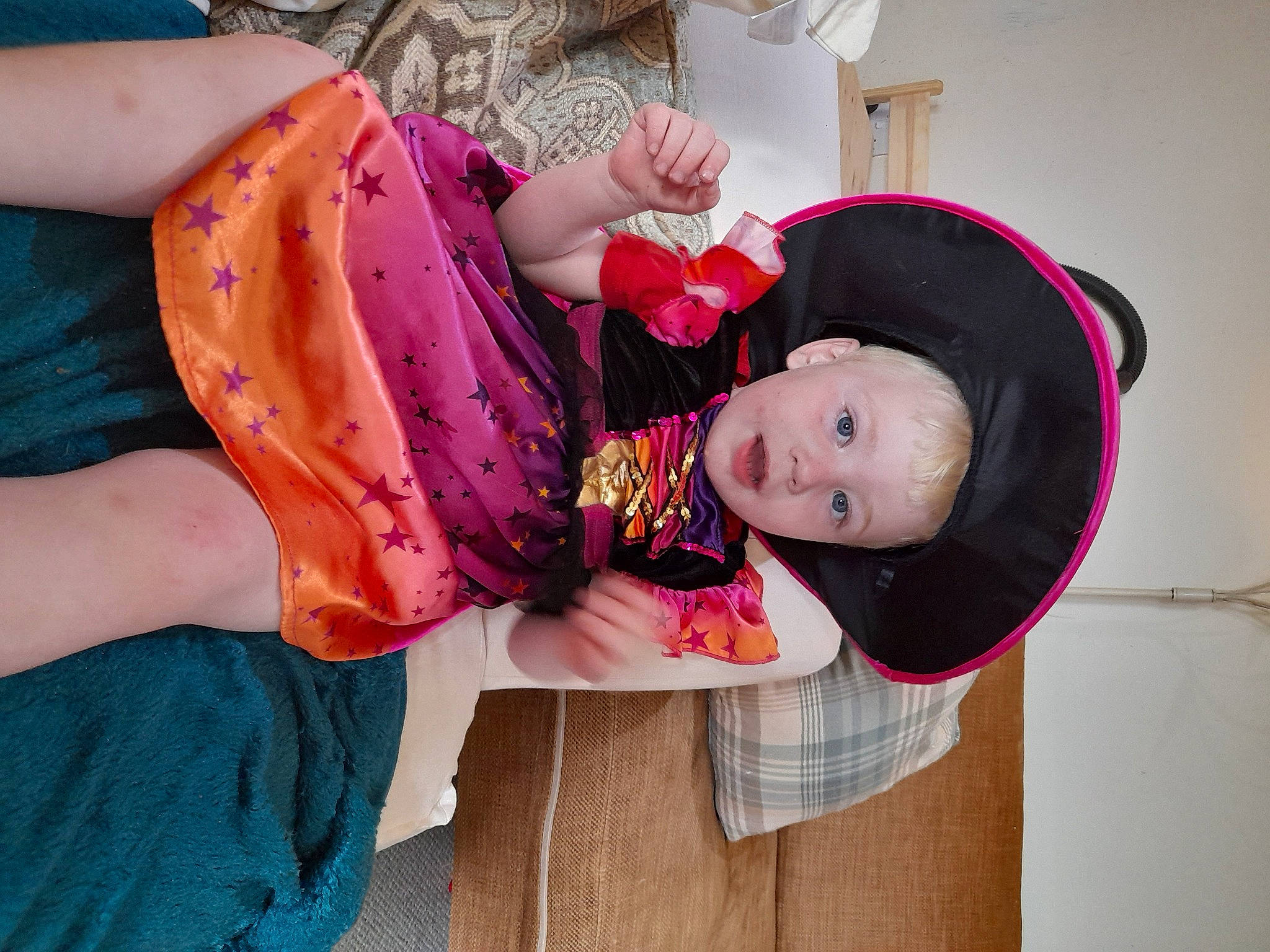 Declan joined the competition — help win amazing prizes! baby, baby_products, baby_toddler_clothing, child, clothing, costume_hat, dress, fashion_accessory, fun, happy, hat, headgear, magenta, pattern, person, pink, plant, sleeve, smile, sun_hat
