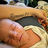 baby, sleeping, infant, arm, tattoo, romans_8_1, skin, blanket, clothing, closeup, peaceful, rest, comfort, person, newborn, soft, indoors, cute, portrait, child
