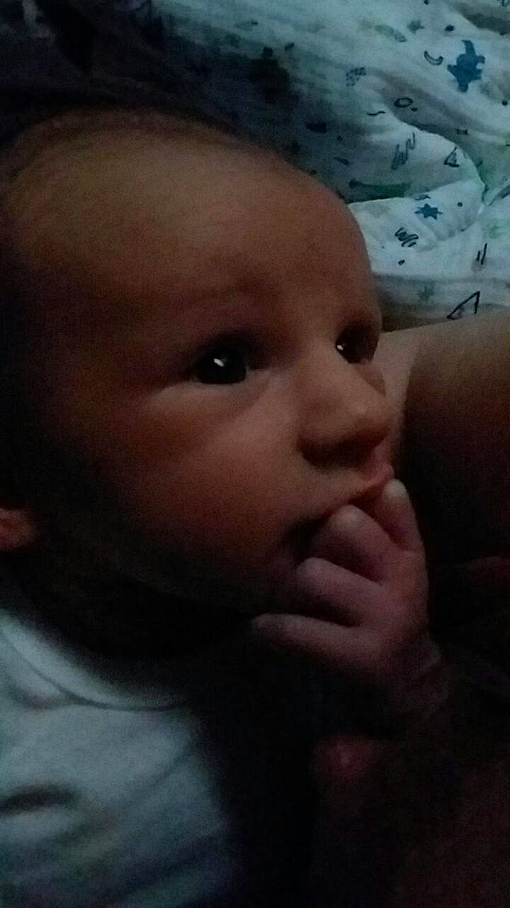 Lawton is registered to the contest to win money with this photo: baby, beauty, cheek, child, chin, close_up, eye, eyebrow, face, finger, forehead, hand, head, human, lip, mouth, nose, organ, person, skin