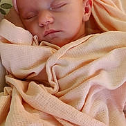 Amaryllis is registered to the contest to win money with this photo: adorable, baby, blanket, child, closeup, cozy, cute, face, headband, indoors, infant, newborn, peace, peaceful, pink_bow, portrait, resting, sleeping, soft_texture, wrapped