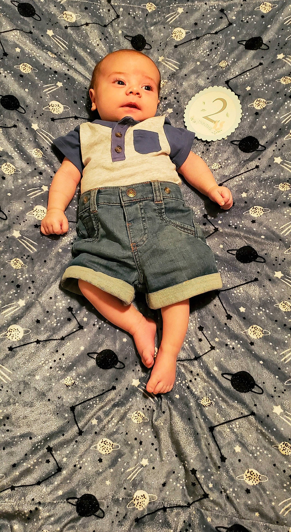 Lyam is registered to the contest to win money with this photo: barefoot, child, child_model, denim, fun, jeans, leg, person, photograph, photography, play, shorts, sitting, standing, textile, toddler, trunk, wood