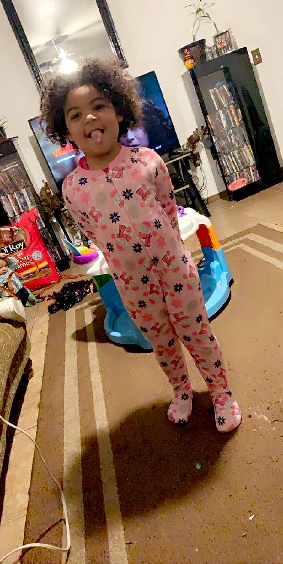 Journie is registered to the contest to win money with this photo: child, clothing, leg, pattern, person, pink, polka_dot, sleeve