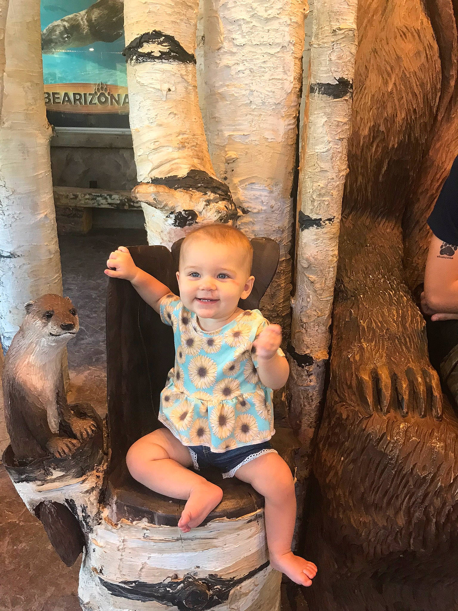 Madilynn is registered to the contest to win money with this photo: child, fun, joy, person, plant, sitting, smile, temple, toddler, tree, trunk, vacation, wood