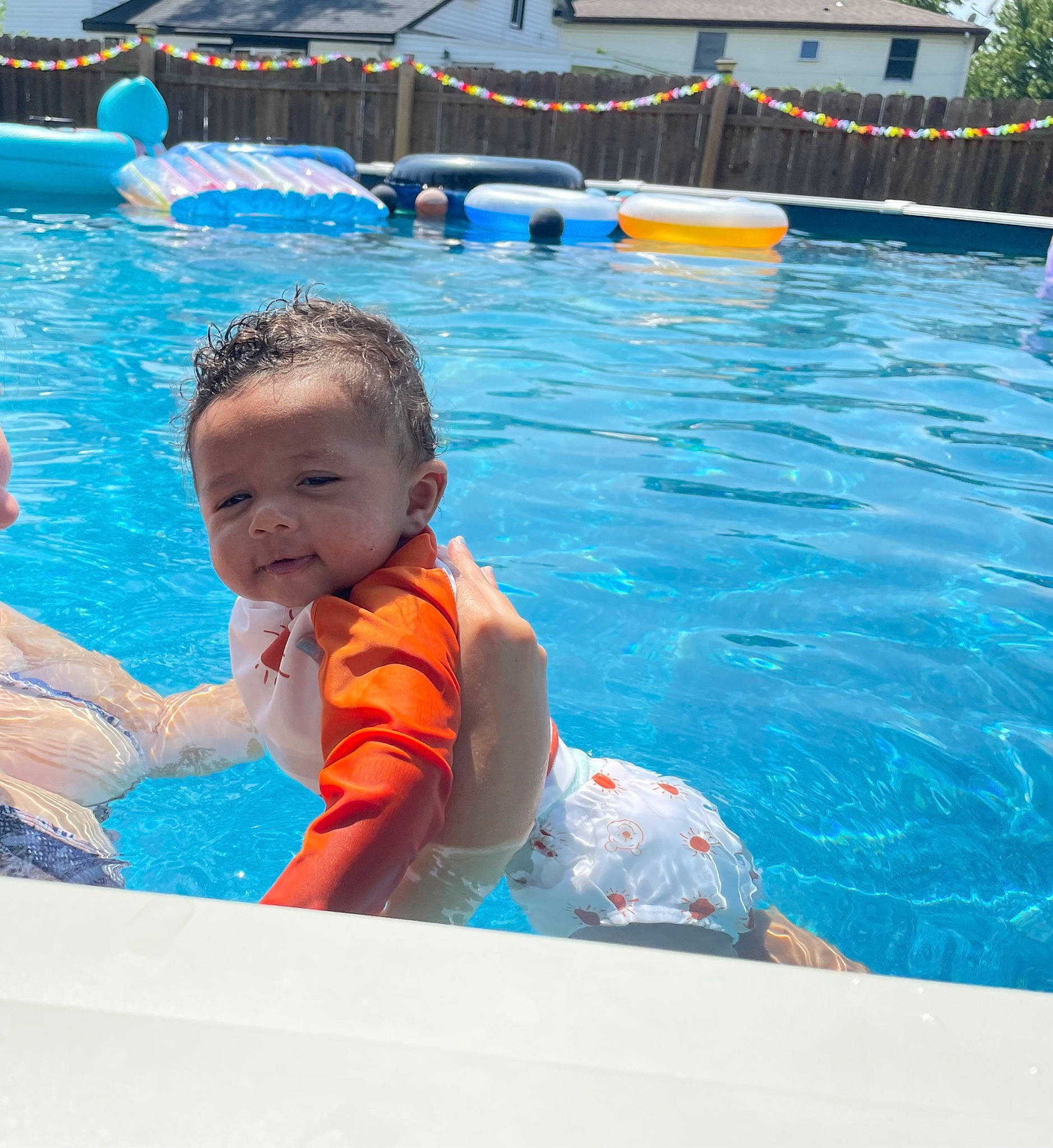 Jakari is registered to the contest to win money with this photo: aqua, azure, baby, baby_float, bathing, blue, fun, games, goggles, happy, headgear, inflatable, leisure, outdoor_recreation, person, personal_protective_equipment, recreation, swimmer, swimming_pool, toddler