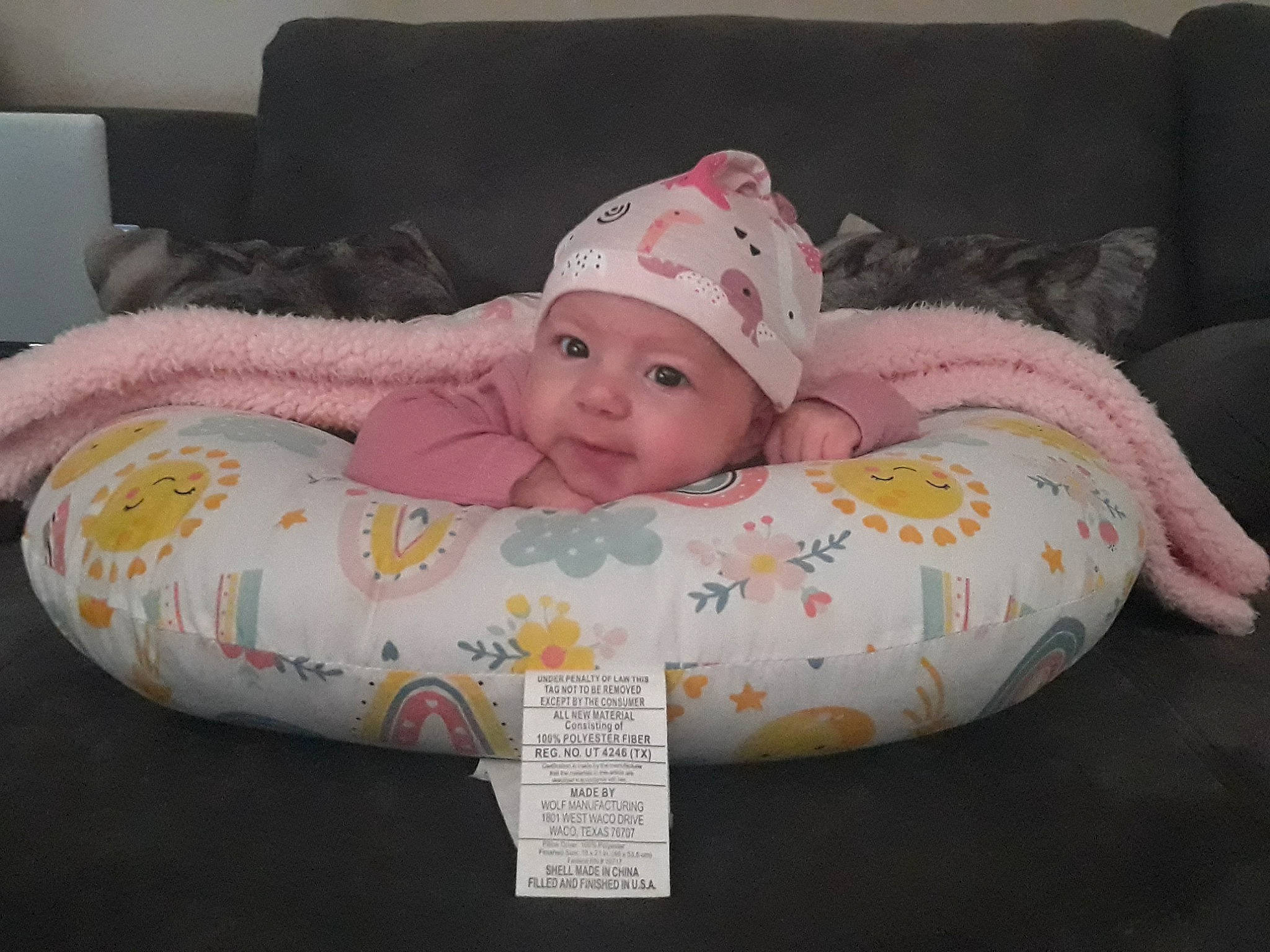 Alice is registered to the contest to win money with this photo: baby, baby_products, baby_safety, baby_sleeping, baby_toddler_clothing, bedding, bedtime, child, comfort, couch, flooring, fun, head, headwear, linens, pattern, person, room, sitting, sleep