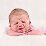 Lyla joined the competition — help win amazing prizes! newborn, baby, infant, face, sleeping, expression, resting, blanket, soft, pink, white, skin, hands, cute, portrait, closeup, child, peaceful, indoors, sleep