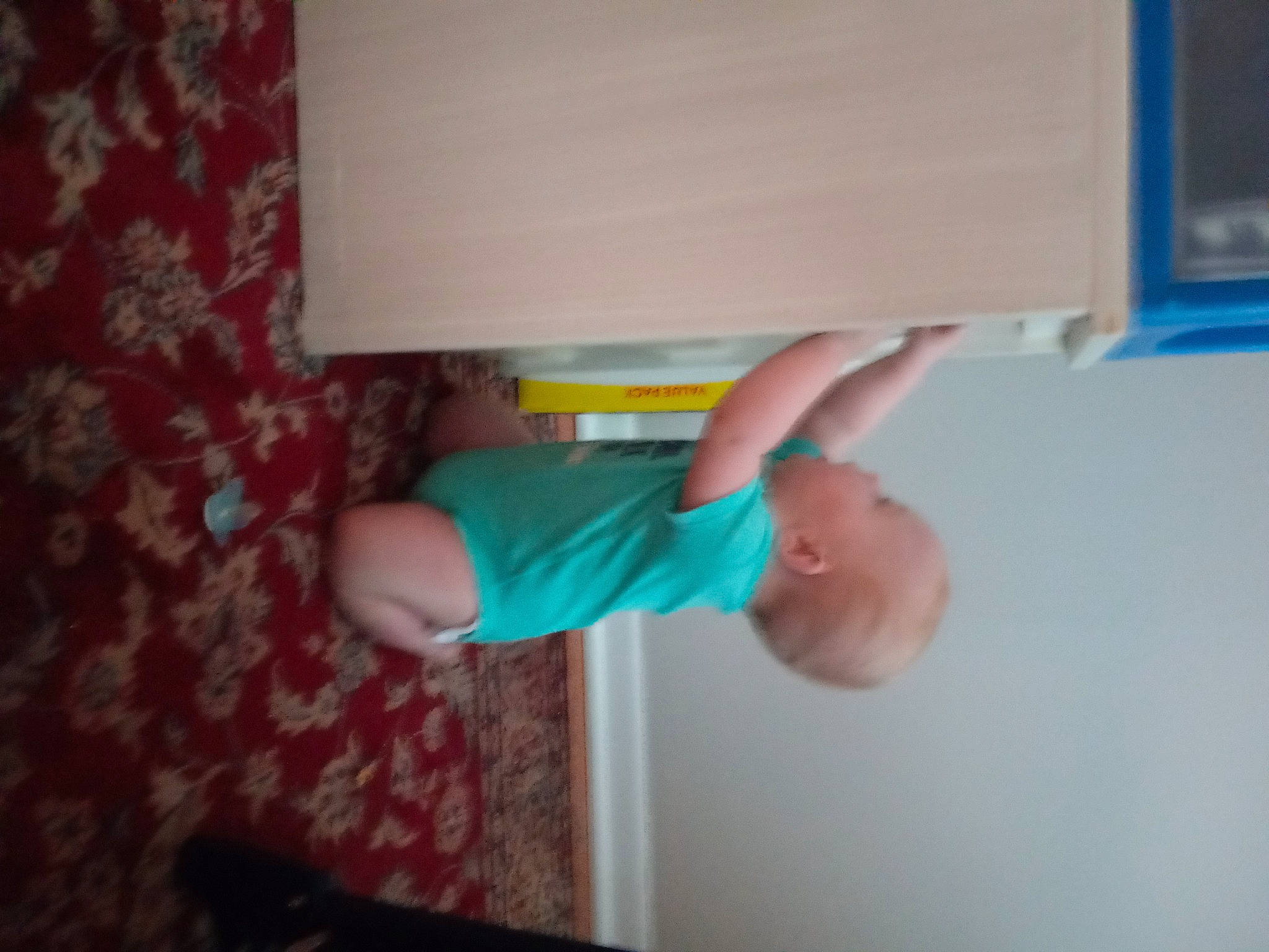 Jeremiah joined the competition — help win amazing prizes! baby, baby_toddler_clothing, ceiling, child, elbow, finger, fun, gesture, hand, knee, nail, person, room, thumb, toddler, wood, wrist